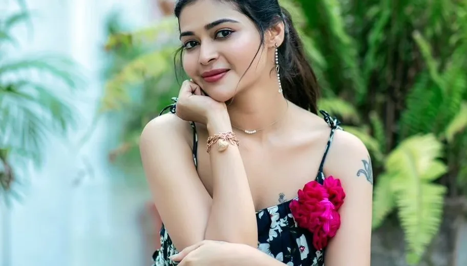 Dharsha Gupta in her bikini smim dress