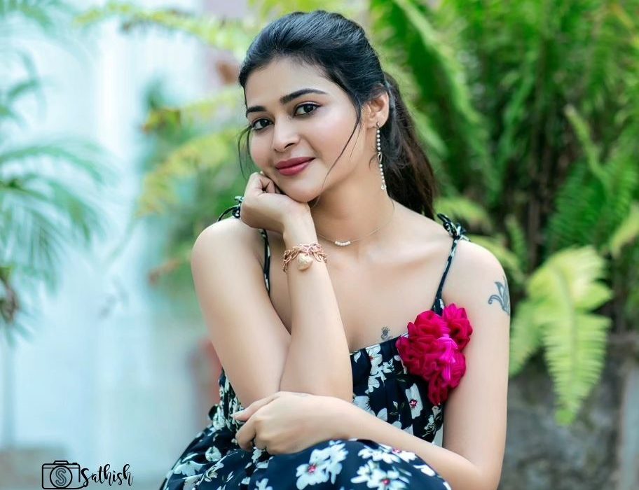Dharsha Gupta in her bikini smim dress